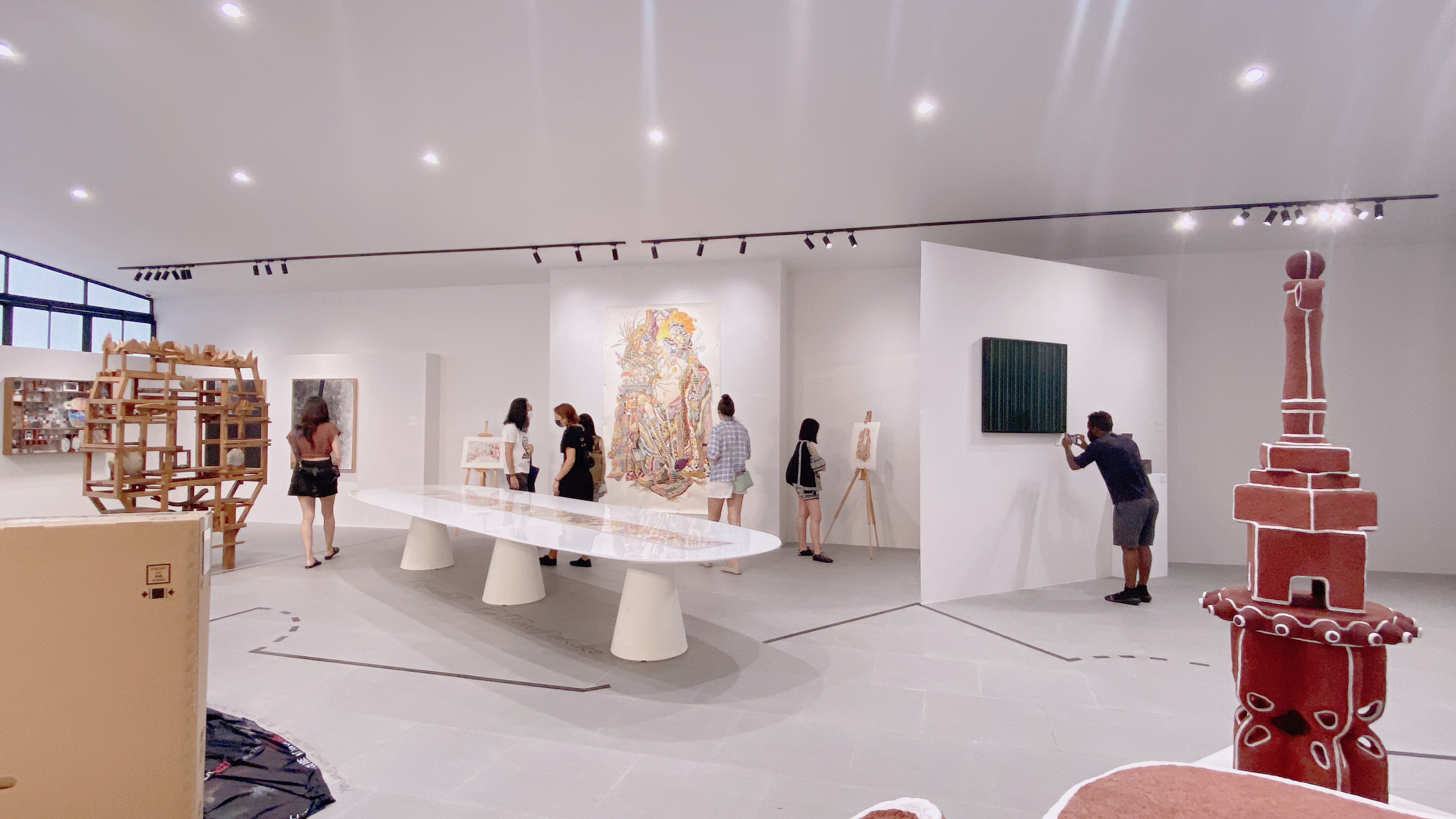 MA Fine Arts students exploring the works at XSpace Gallery.