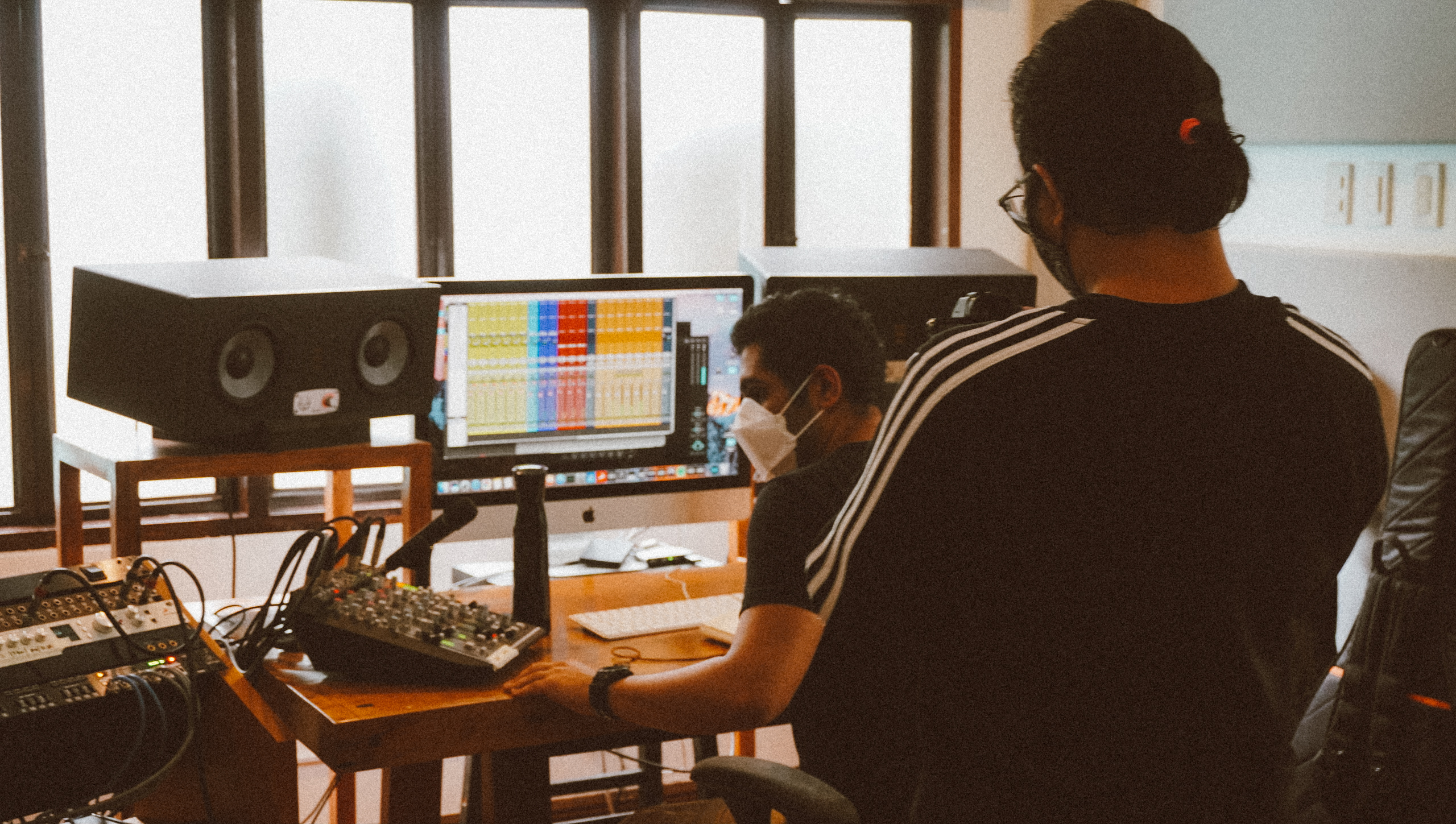 Nik behind the console at Line In Records.